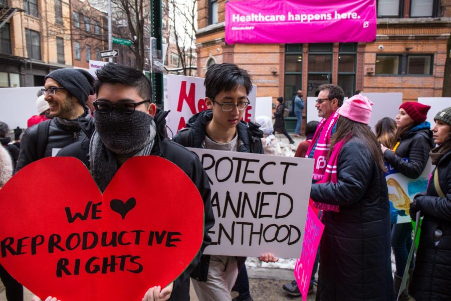 Unknown civilians in New York City at a Planned Parenthood Rally.