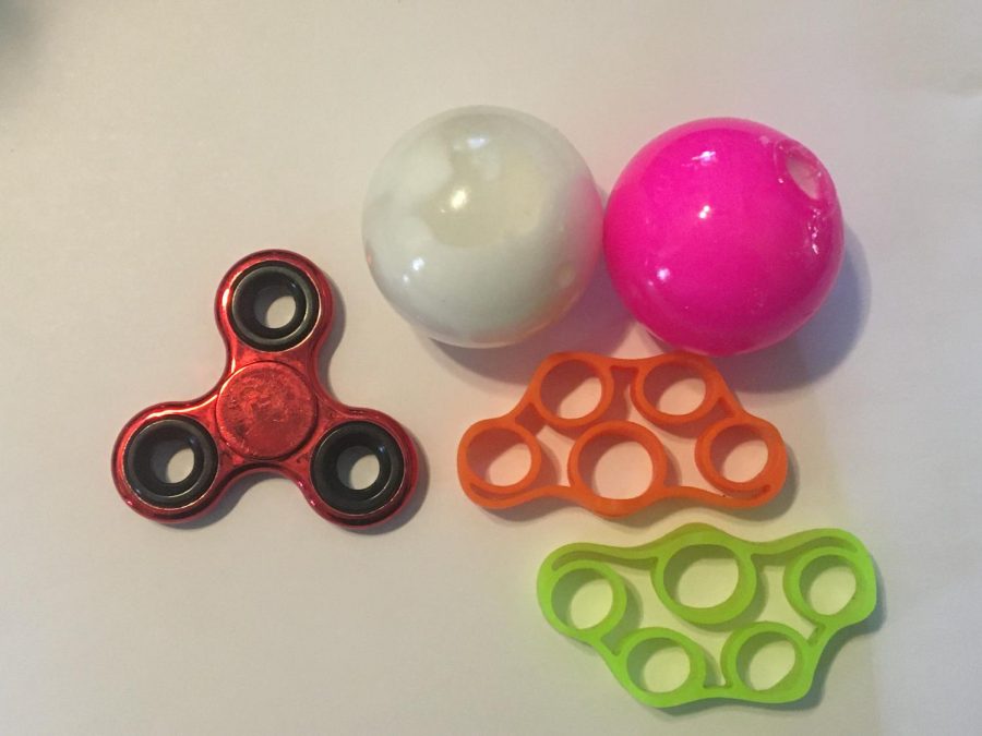There are a variety of fidgets toys people enjoy to use like the ones shown.