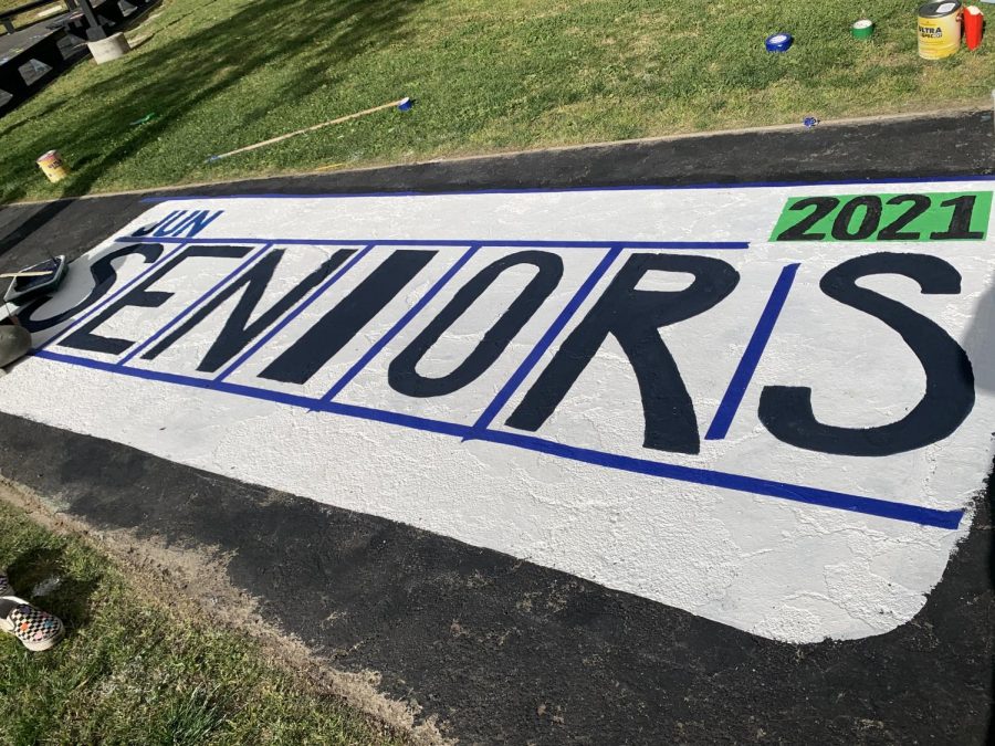 ASB currently in the process of decorating this Senior sign.