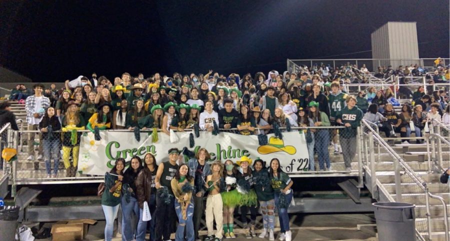 Our Green Machine cheering on our Cowboys!!!
