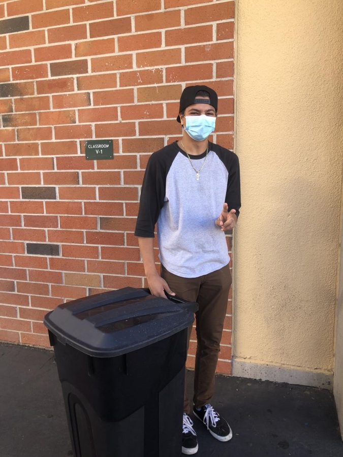 Marcus Botros wheeling around a trashcan for anything but a backpack day.