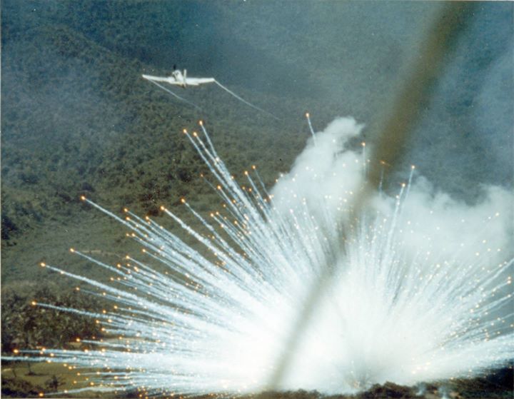 A U.S. Air Force Douglas A-1E Skyraider drops a white phosphorus bomb on a Viet Cong postion in South Vietnam in 1966.