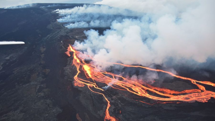 Mauna Loas eruption sent lava flows cascading down slope, impacting the road used to access the Mauna Loa Observatory and cutting off power to maintain critical climate tool.