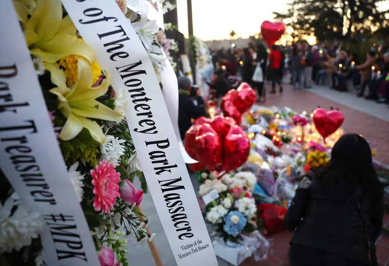People+gather+at+a+memorial+for+the+victims+of+a+mass+shooting+over+the+weekend+at+a+ballroom+dance+studio+in+Monterey+Park%2C+Calif.