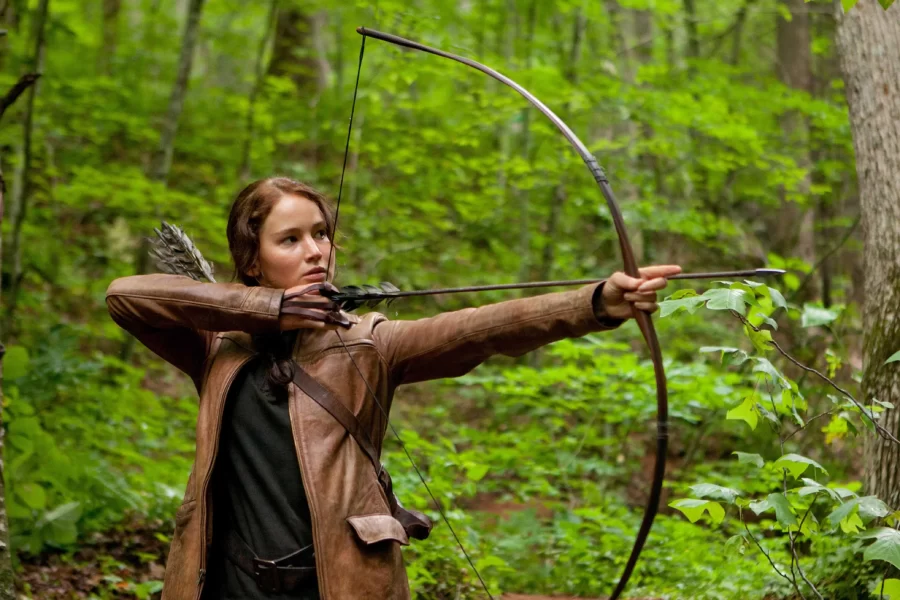 Katniss Everdeen shooting an arrow.