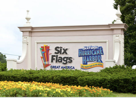 An entrance sign to Six Flags Great America- an amazing outdoor theme park with roller coster rides and water park -Hurricane Harbor