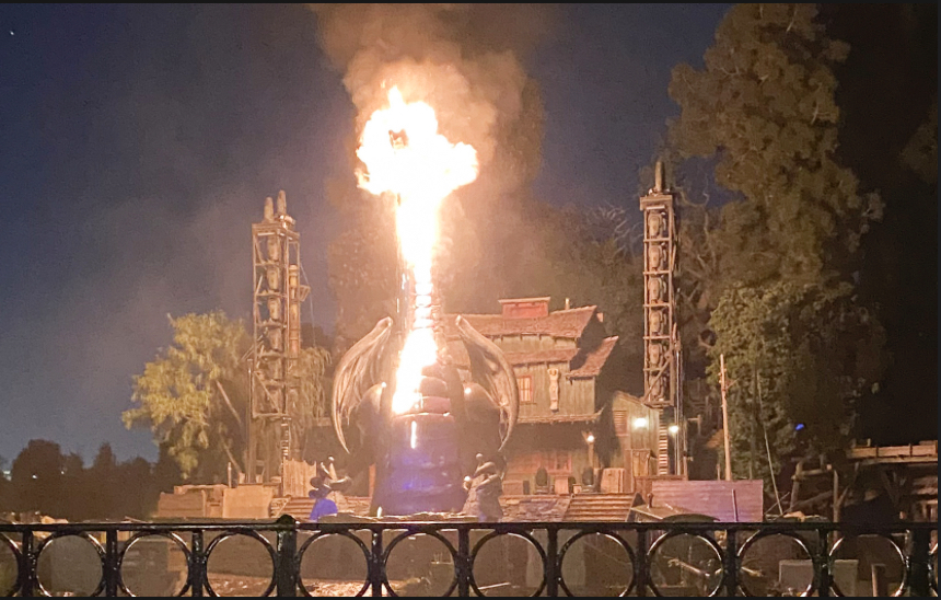 A fire-breathing dragon bursts into flames during a popular Disneyland show.