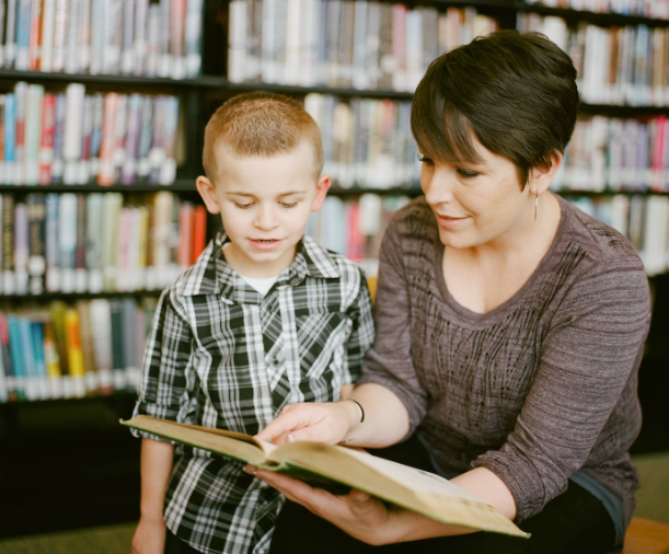 Parents helping their kids read can help them reach their reading goals.