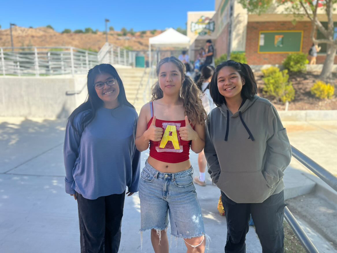 Seniors (from left to right) Nat, Julie, and Angela dressed up as "Alvin and the Chimpmunks"