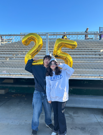 Seniors Diego Melara and Berlynn Del Cid posing at senior sunrise.