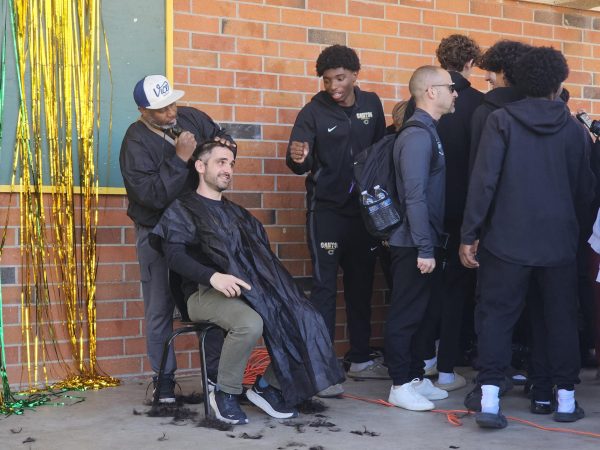 Mr. Gatzas Getting His Head Shaved