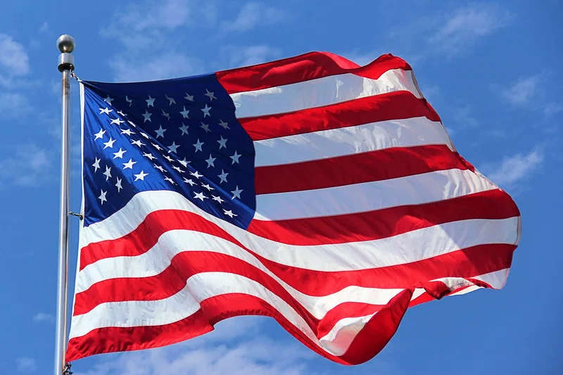 An American flag blowing in the wind 