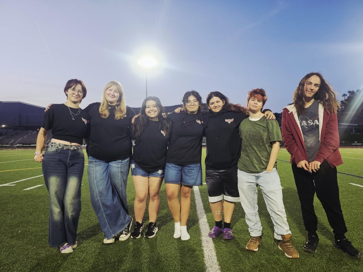 The Goblins at Senior Sunset [Left to Right: Elise Haupt, Kayleigh Behar, Isys Garcia Morrison, Vee Segovia, Malia Tyra, Asher Parks, Lily Angelo]